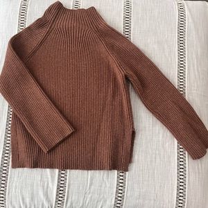 Brown ribbed turtleneck sweater